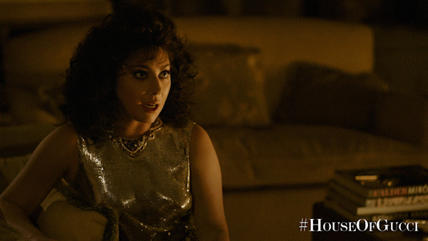 A woman saying "It's time to take out the trash."