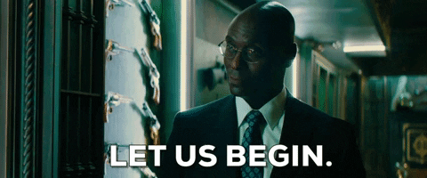 A man saying, "Let us begin."